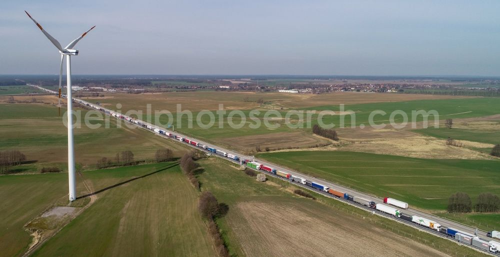 Güldendorf from above - Lorries crowded in traffic jams in the lanes of the route of the motorway BAB A12 in Gueldendorf in the state Brandenburg, Germany