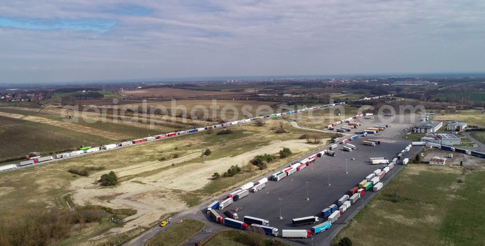 Aerial image Frankfurt (Oder) - Lorries crowded in traffic jams in the lanes of the route of the motorway on Rastplatz of BAB A12 in Frankfurt (Oder) in the state Brandenburg, Germany