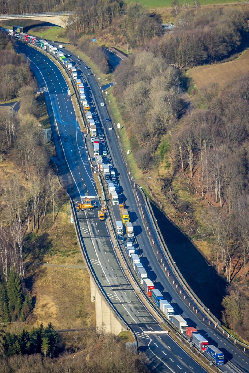 Aerial image sterbecke - Lorries crowded in traffic jams on the lanes of the route of the Autobahn BAB 45 on the valley bridge Sterbecke in Sterbecke in the state North Rhine-Westphalia, Germany
