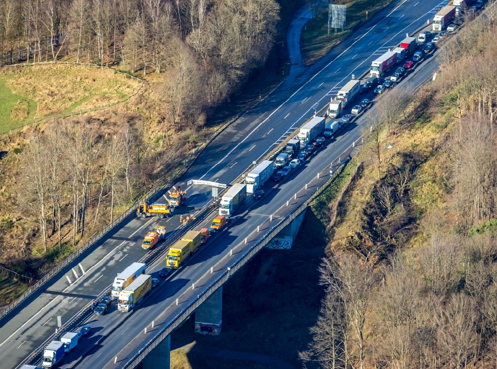 sterbecke from above - Lorries crowded in traffic jams on the lanes of the route of the Autobahn BAB 45 on the valley bridge Sterbecke in Sterbecke in the state North Rhine-Westphalia, Germany