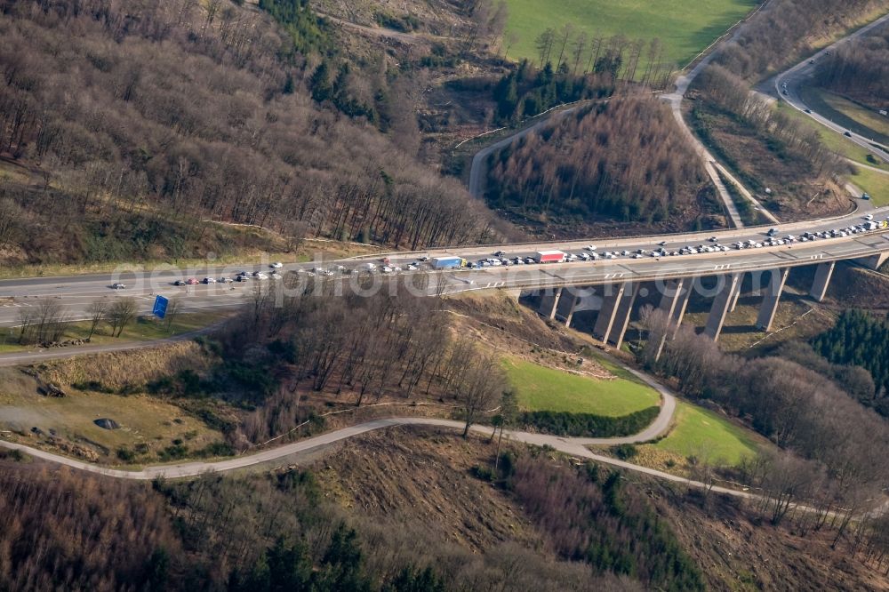 sterbecke from above - Lorries crowded in traffic jams on the lanes of the route of the Autobahn BAB 45 on the valley bridge Sterbecke in Sterbecke in the state North Rhine-Westphalia, Germany