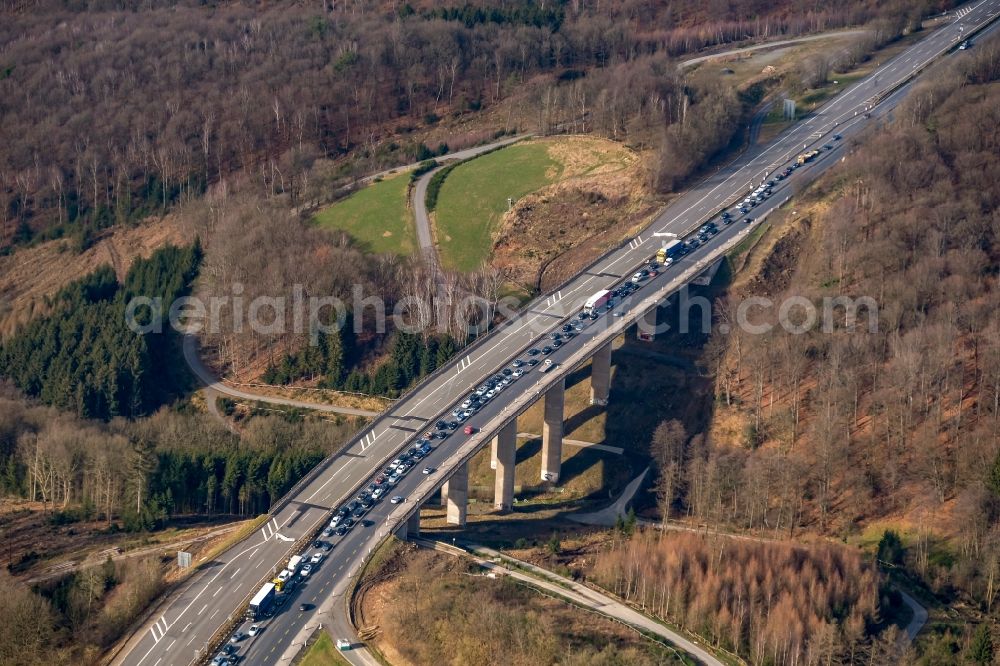 sterbecke from the bird's eye view: Lorries crowded in traffic jams on the lanes of the route of the Autobahn BAB 45 on the valley bridge Sterbecke in Sterbecke in the state North Rhine-Westphalia, Germany