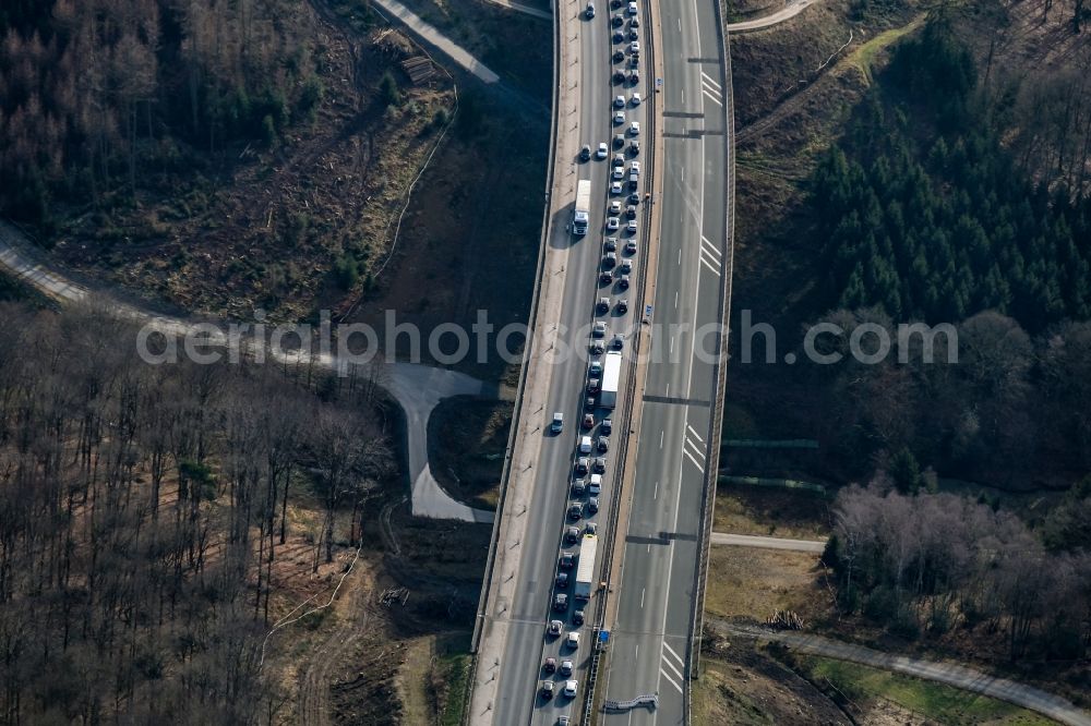 Aerial image sterbecke - Lorries crowded in traffic jams on the lanes of the route of the Autobahn BAB 45 on the valley bridge Sterbecke in Sterbecke in the state North Rhine-Westphalia, Germany