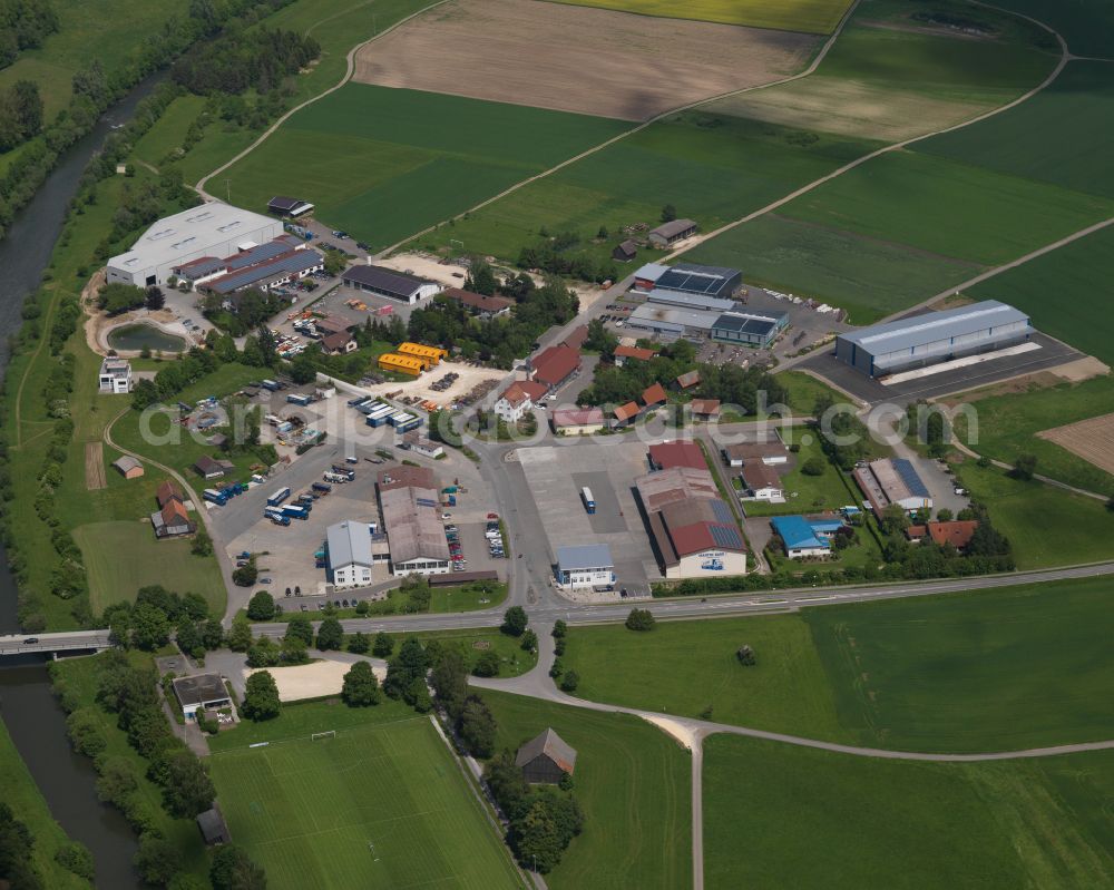Aerial image Binzwangen - Industrial and commercial area on the edge of agricultural fields and fields on street Riedstrasse in Binzwangen in the state Baden-Wuerttemberg, Germany