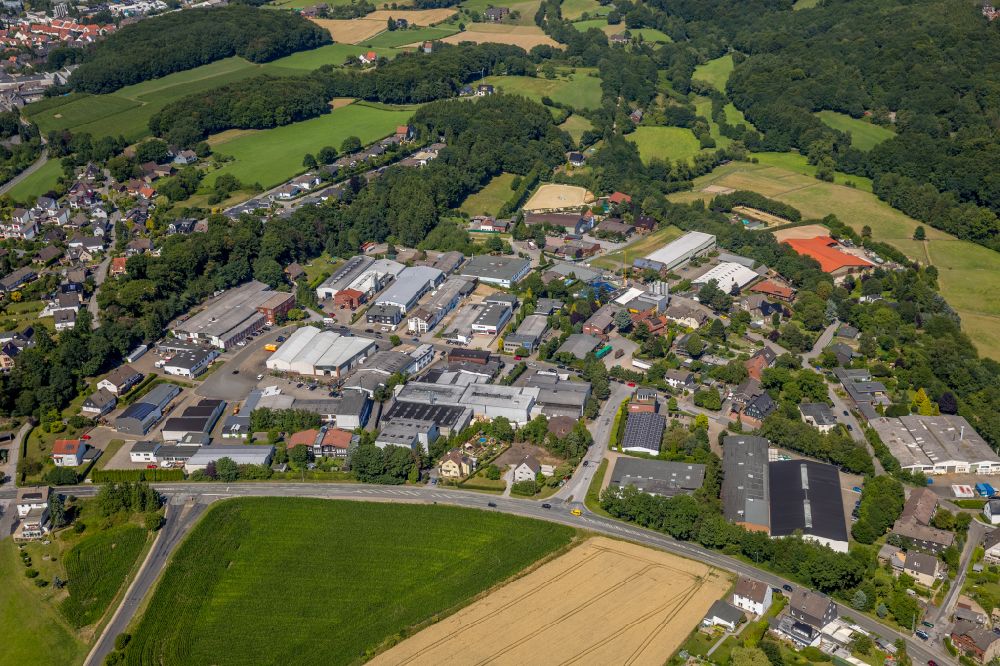 Bossel from above - Industrial and commercial area on the edge of agricultural fields and fields in Bossel in the state North Rhine-Westphalia, Germany