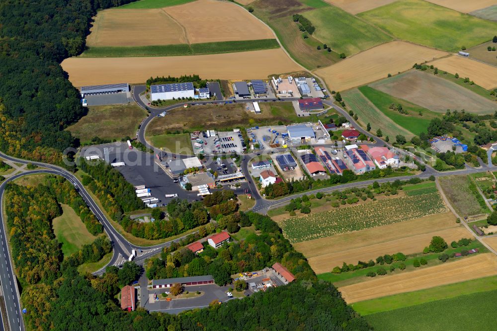 Aerial image Erbshausen-Sulzwiesen - Industrial and commercial area on the edge of agricultural fields and fields in Erbshausen-Sulzwiesen in the state Bavaria, Germany