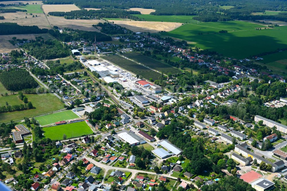 Klosterfelde from above - Industrial and commercial area on the edge of agricultural fields and fields on street Beusterstrasse in Klosterfelde in the state Brandenburg, Germany