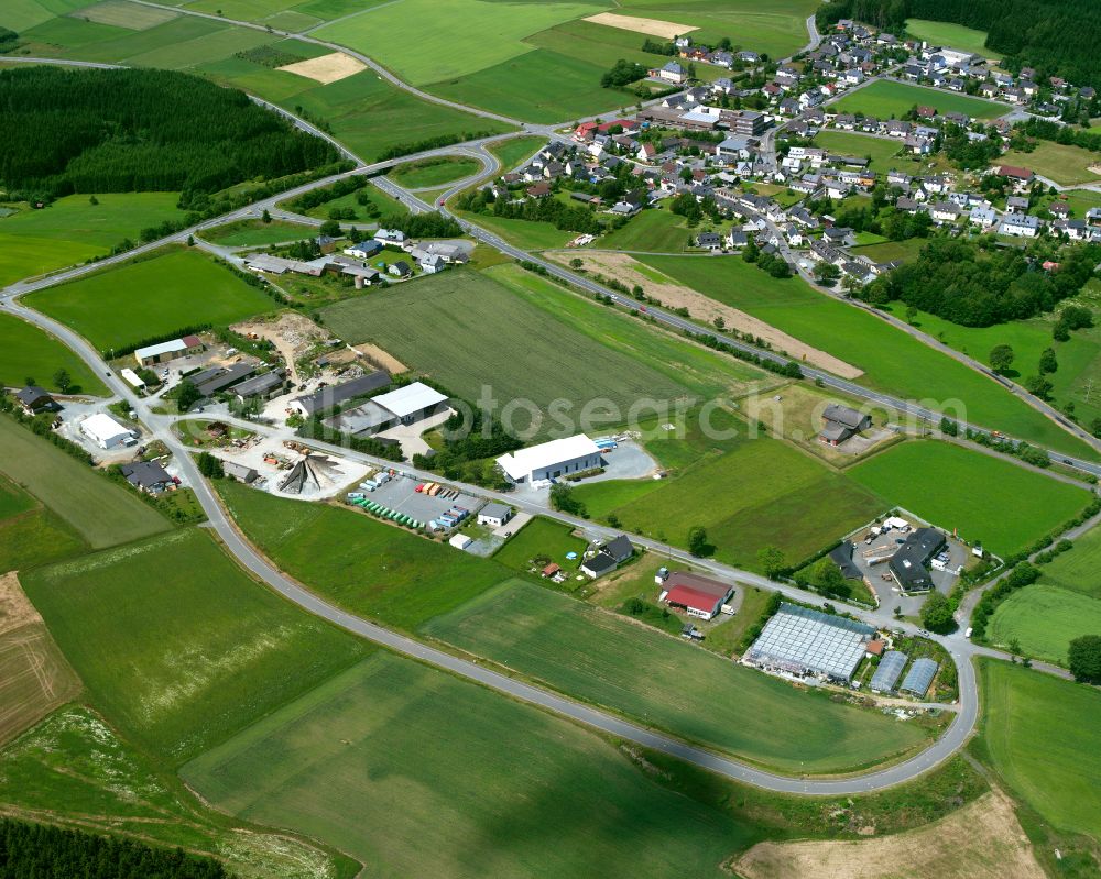 Straßdorf from above - Industrial and commercial area on the edge of agricultural fields and fields in Straßdorf in the state Bavaria, Germany