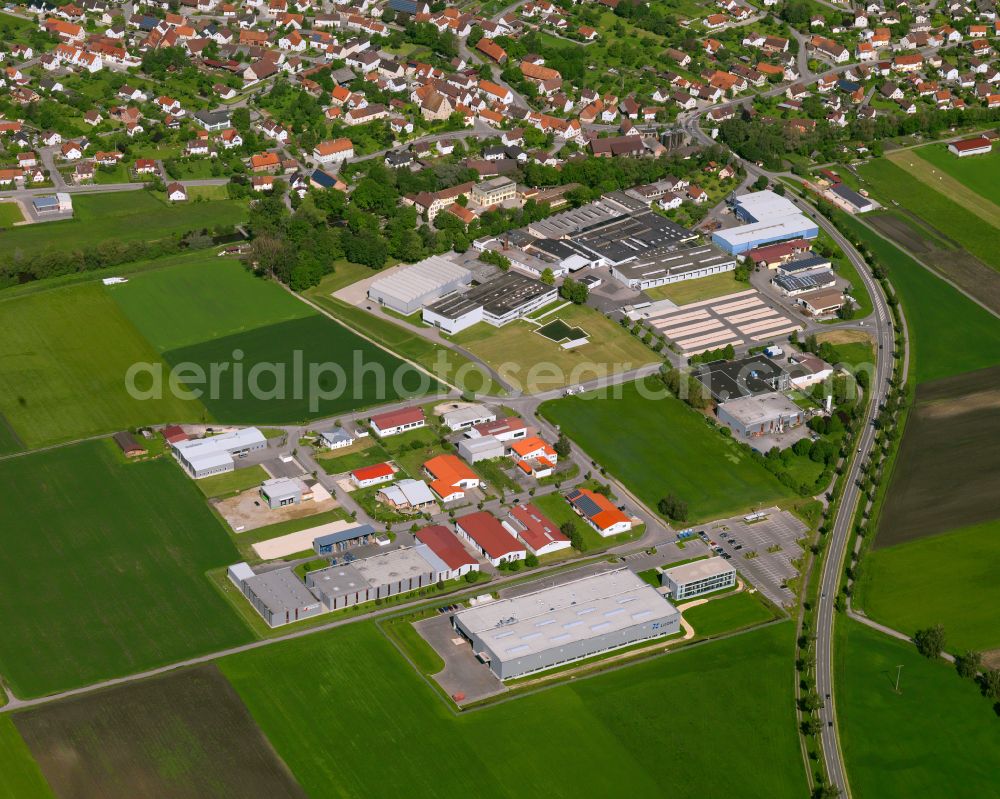 Aerial image Untersulmetingen - Industrial and commercial area on the edge of agricultural fields and fields in Untersulmetingen in the state Baden-Wuerttemberg, Germany