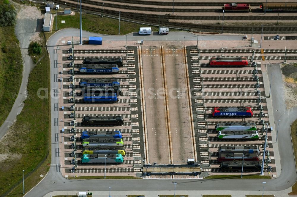 Hamburg from above - Locomotive service station and depot with sliding platform system and lock parking spaces of ajax Loktechnik GmbH in the district Altenwerder in Hamburg, Germany