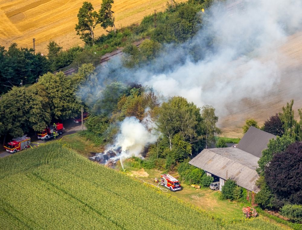Kamen from above - Fire fighting at the fire brigade on fire the building on Karl-Wilhelm Poth Derner Strasse in Kamen in the state North Rhine-Westphalia, Germany