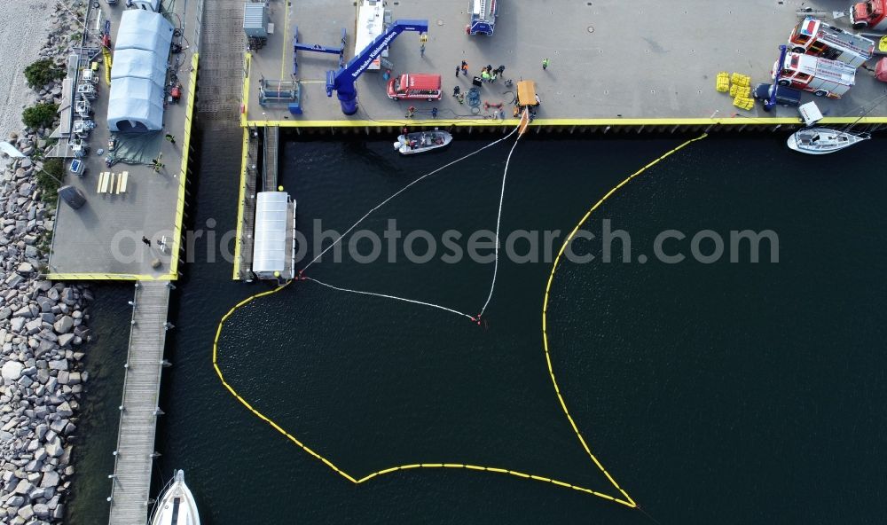 Aerial photograph Kühlungsborn - Erection of oil barriers on the water surface in the port to the Baltic Sea in Kuehlungsborn in the state Mecklenburg - Western Pomerania, Germany
