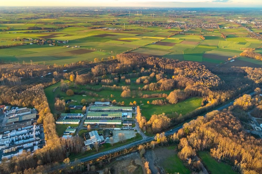 Aerial photograph Werl - Aerial view of the Westerhaar industrial estate with TUeV NORD test centre Wickede Werl and golf course Golfclub-Werl e.V.in Werl in the Sauerland region in North Rhine-Westphalia, Germany
