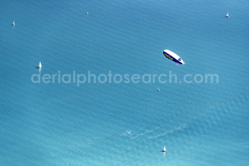 Aerial photograph Konstanz - Airship ueber dem Bodensee and on See Segelboote and Boote of Bodensee Schifffahrt in flight over the airspace in Konstanz in the state Baden-Wuerttemberg, Germany