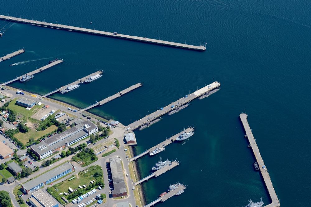 Eckernförde from the bird's eye view: Naval base of the german navy with ships anchoring in the haven at the coastline of the baltic sea in Eckernfoerde in the state Schleswig-Holstein