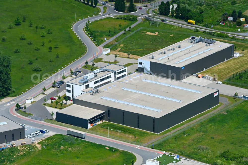 Bensheim from the bird's eye view: Buildings and production halls on the site of the mechanical engineering company of PFAFF Industriesysteme and Maschinen GmbH on street Bertha-Benz-Strasse in Bensheim in the state Hesse, Germany