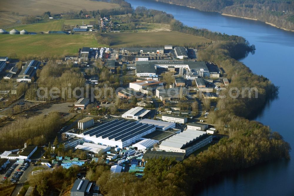 Schwerin from the bird's eye view: Buildings and production halls on the site of the mechanical engineering company of SES factoryzeugbau Schwerin GmbH on den Sacktonnen in Schwerin in the state Mecklenburg - Western Pomerania, Germany