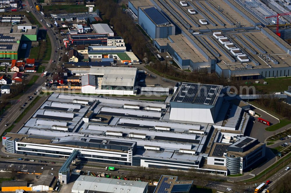 Aerial image Bruchsal - Buildings and production halls on the site of the mechanical engineering company of SEW-EURODRIVE GmbH & Co KG on street Ernst-Blickle-Strasse in the district Untergrombach in Bruchsal in the state Baden-Wuerttemberg, Germany