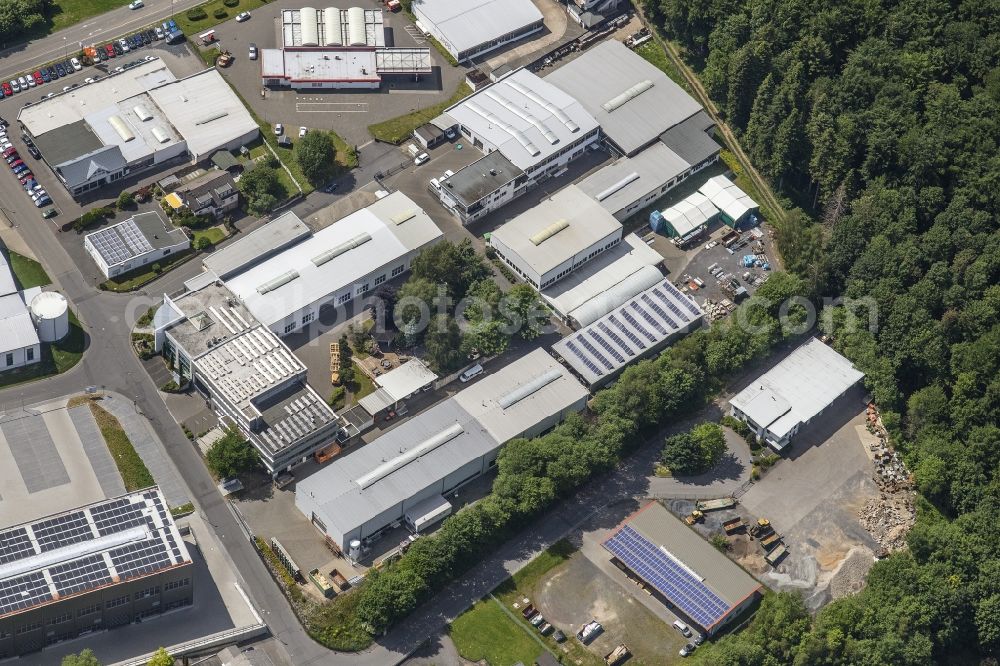 Aerial photograph Rengsdorf - Buildings and production halls on the site of the mechanical engineering company of Winkler and Duennebier Suesswarenmaschinen GmbH on Ringstrasse in Rengsdorf in the state Rhineland-Palatinate, Germany