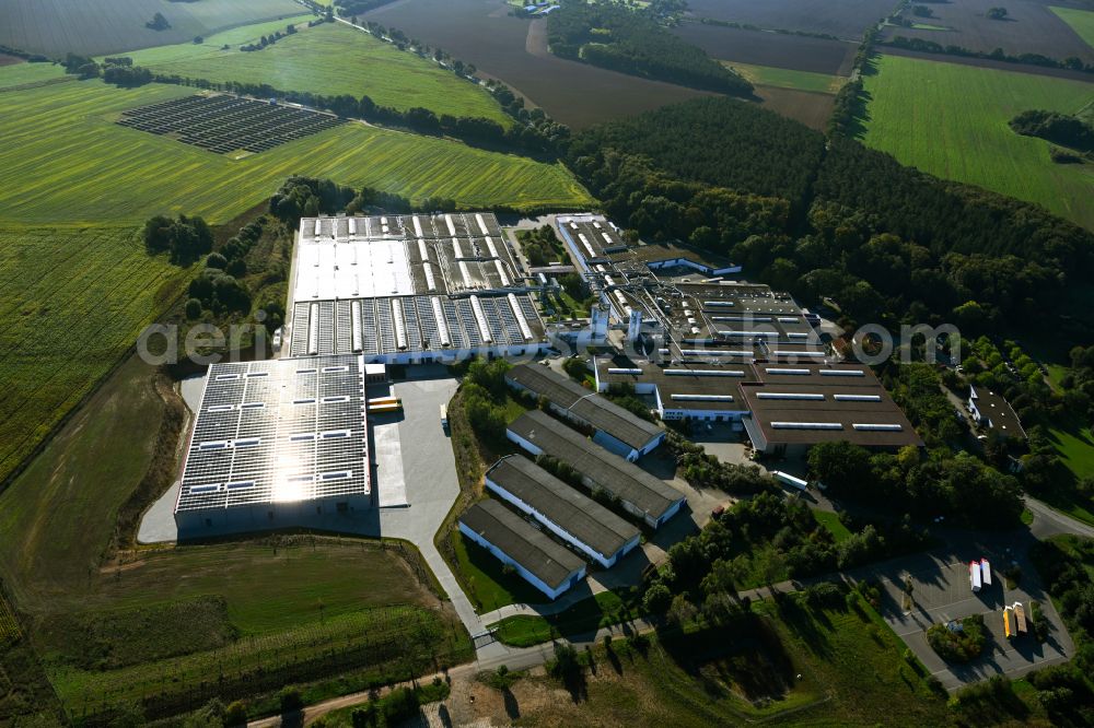 Aerial photograph Meyenburg - Buildings and production halls on the premises of the cabinet maker company on street Freyensteiner Strasse of Meyenburger Moebel GmbH on street Freyensteiner Strasse in Meyenburg in the state Brandenburg, Germany