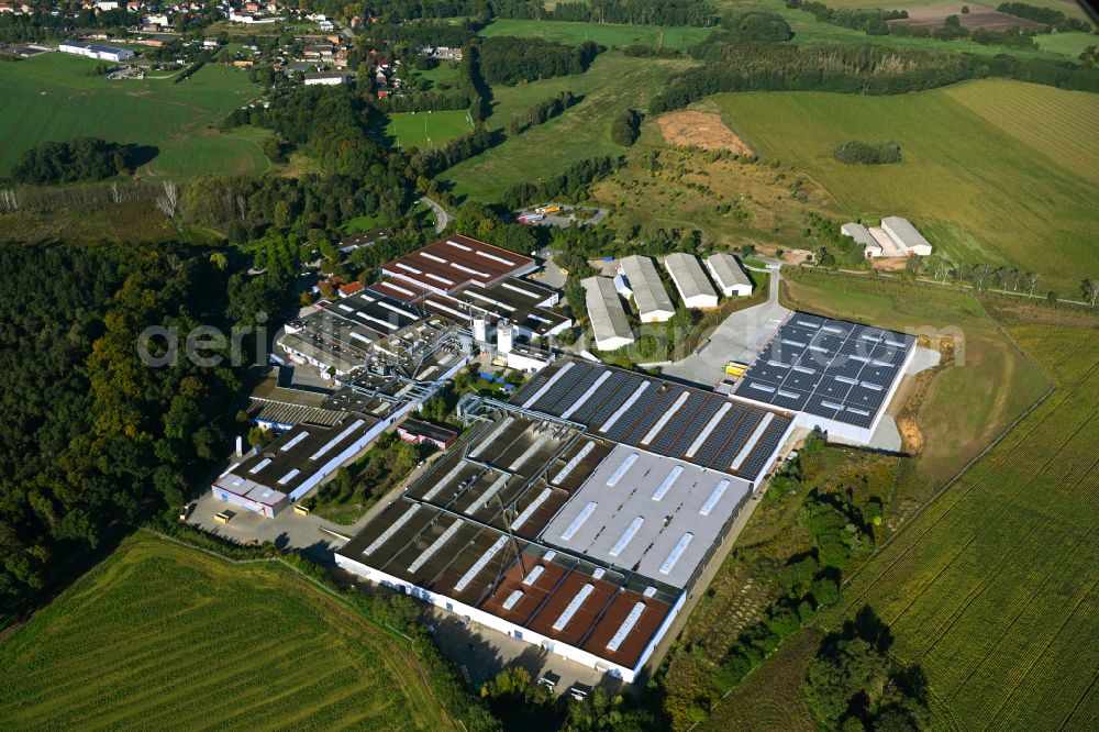 Meyenburg from the bird's eye view: Buildings and production halls on the premises of the cabinet maker company on street Freyensteiner Strasse of Meyenburger Moebel GmbH on street Freyensteiner Strasse in Meyenburg in the state Brandenburg, Germany
