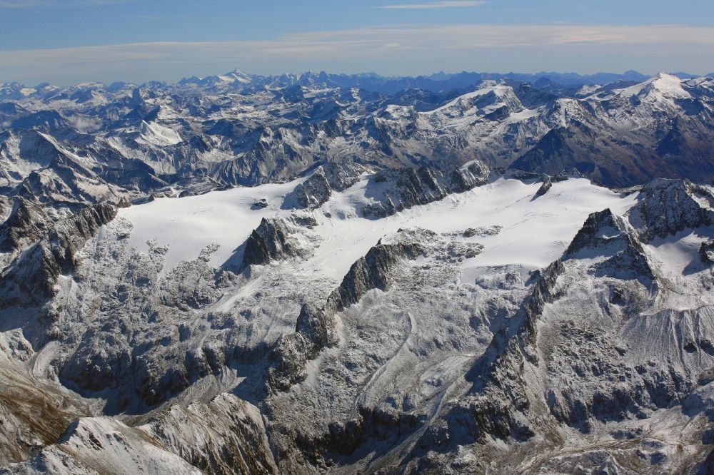 Sumvitg from the bird's eye view: Glacier Medelsergletscher in the rock and mountain landscape in the canton Grisons, Switzerland. The Medelser Glacier is also suffering glacial melting because of the climate change