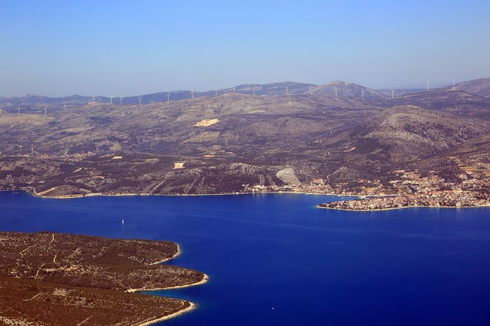Seget Donji from above - Townscape on the seacoast of Adriatic Sea in Seget Donji in Splitsko-dalmatinska zupanija, Croatia