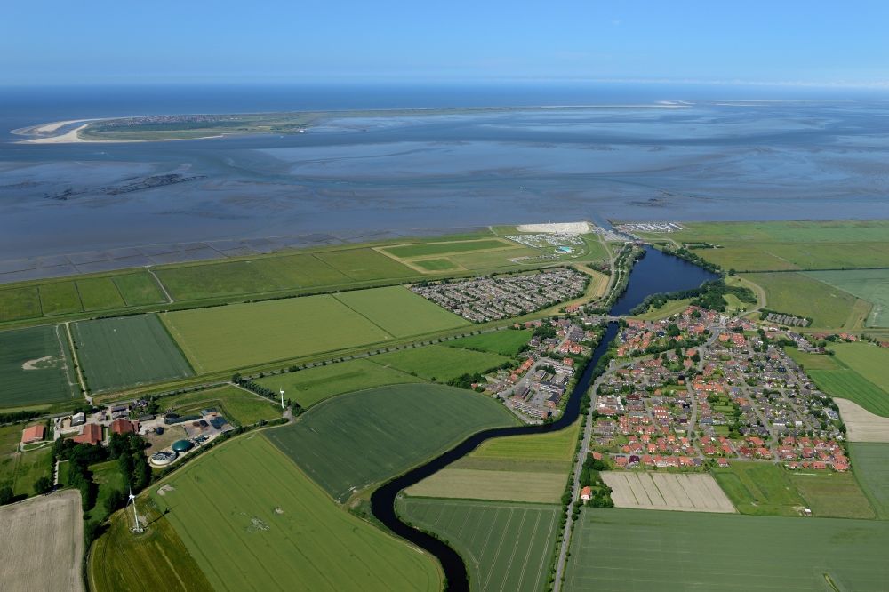 Dornum from above - Townscape on the seacoast of North Sea in Dornum in the state Lower Saxony