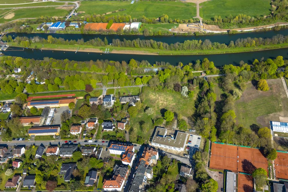 Hamm from the bird's eye view: New multi-family housing estate on Braendstroemstrasse with a view of the Lippe River and the Datteln-Hamm Canal in the district of Heessen in Hamm in the Ruhr area in the state of North Rhine-Westphalia, Germany