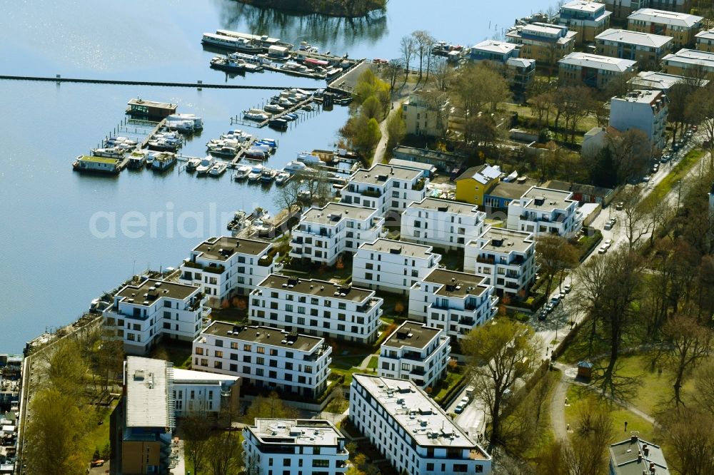 Berlin from above - Residential area of a??a??an apartment building with boat jetties on the banks of the Stralau peninsula in the Rummelsburg Bay in the Friedrichshain district of Berlin, Germany