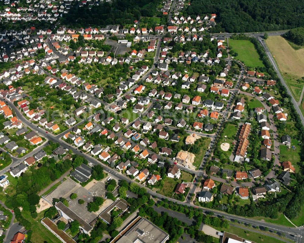 Kleinlinden from the bird's eye view: Residential area of a multi-family house settlement in Kleinlinden in the state Hesse, Germany