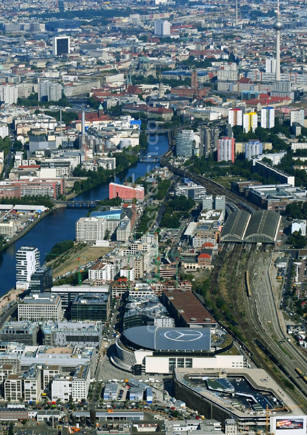 Aerial photograph Berlin - Arena Mercedes-Benz-Arena on Friedrichshain part of Berlin. The former O2 World - now Mercedes-Benz-Arena - is located in the Anschutz Areal, a business and office space on the riverbank