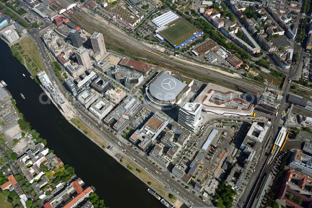 Aerial image Berlin - Arena Mercedes-Benz-Arena on Friedrichshain part of Berlin. The former O2 World - now Mercedes-Benz-Arena - is located in the Anschutz Areal, a business and office space on the riverbank