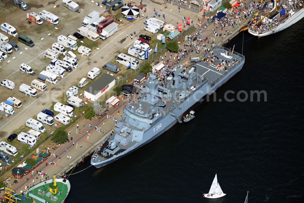 Rostock from above - Mass on a ship - specialized vessel of the Federal Navy at the Hanse Sail in the port in Rostock in the state Mecklenburg - Western Pomerania