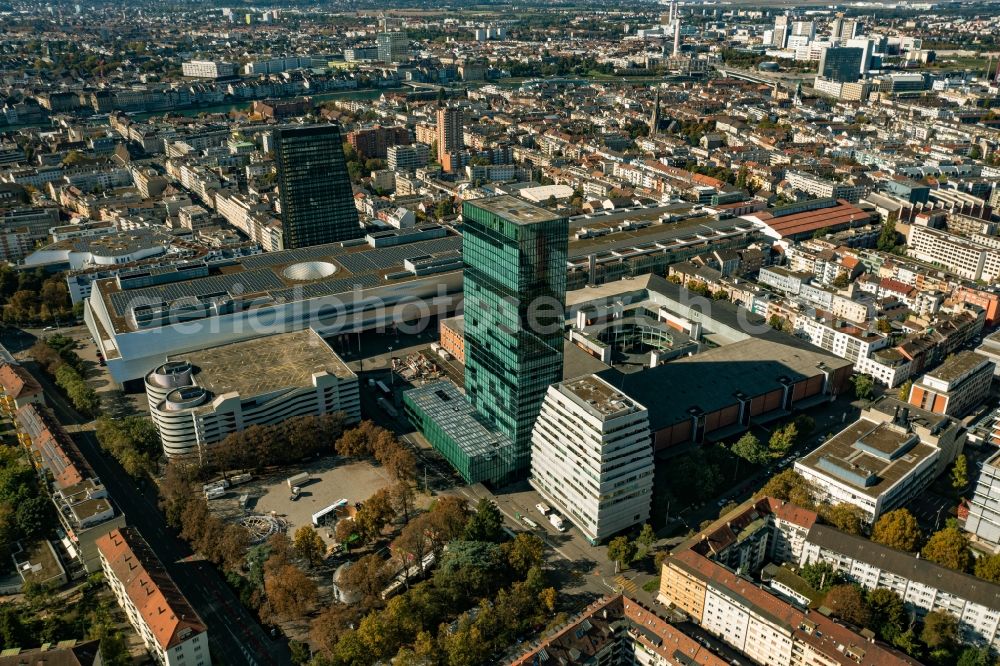 Aerial photograph Basel - Overview of the exhibition halls, exhibition skyscraper and the fair building in Basel, Switzerland. Also seen the railway Station Badischer Bahnhof and the agrobusiness company Syngenta