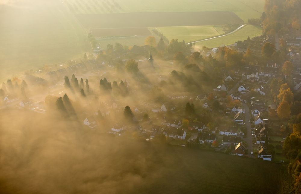 Mintard from above - Mintard in the valley of the river Ruhr after sunrise in fog in the state of North Rhine-Westphalia