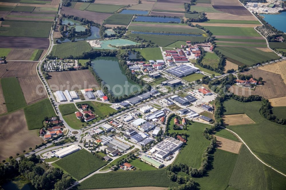 Aerial photograph Haselfurth - Mixed development of the residential and commercial area with bathing lake in Haselfurth in the state Bavaria, Germany