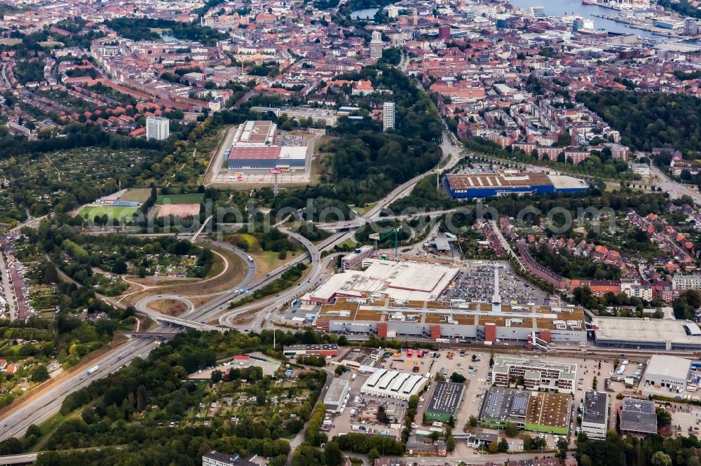 Aerial photograph Kiel - Mixed development of the residential and commercial settlement Kiel-Hassee on the federal highway A215 in Kiel in the state Schleswig-Holstein, Germany