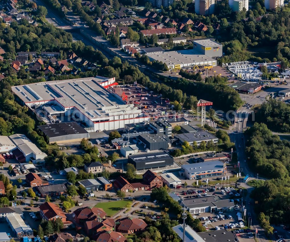 Schwentinental from the bird's eye view: Mixing of residential and commercial settlements Schwentinental- Raisdorf in Schwentinental in the state Schleswig-Holstein, Germany