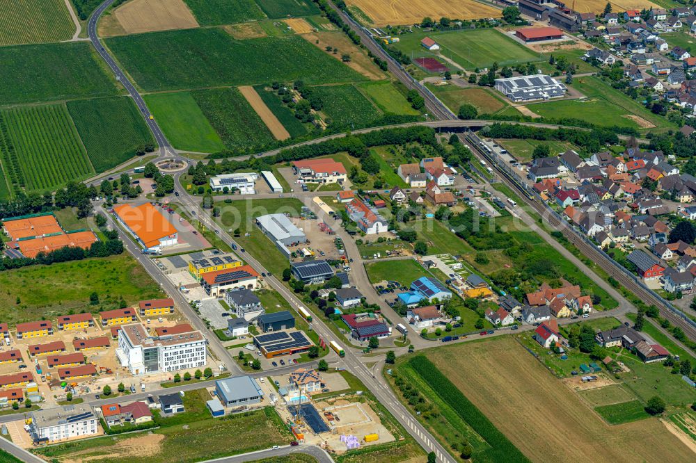 Aerial image Ringsheim - Mixing of residential and commercial settlements Westlich of Bahnlinie with Bahnhof in Ringsheim in the state Baden-Wuerttemberg, Germany