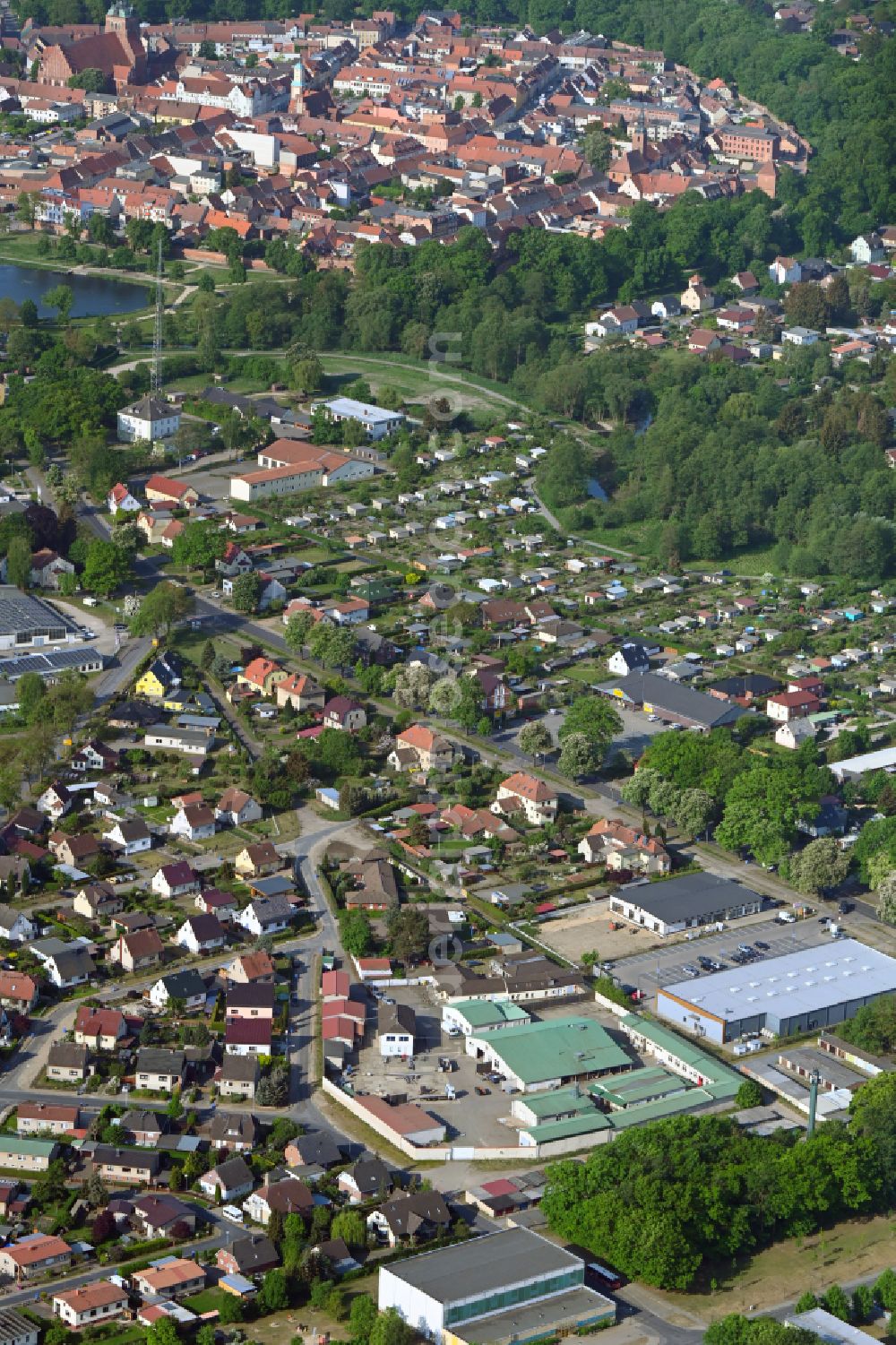 Wittstock/Dosse from the bird's eye view: Mixing of residential and commercial settlements on street Am Neuen Weg in the district Sudrowshof in Wittstock/Dosse in the state Brandenburg, Germany