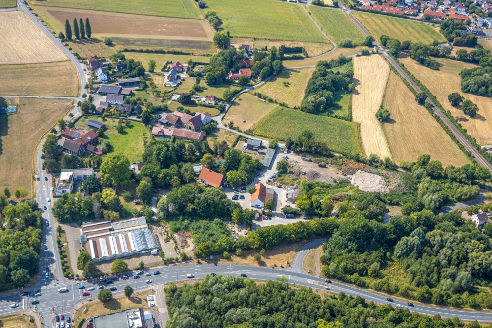 Hamm from the bird's eye view: Mixing of residential and commercial settlements between of Strasse Ostdorf and Werler Strasse in the district Westtuennen in Hamm at Ruhrgebiet in the state North Rhine-Westphalia, Germany