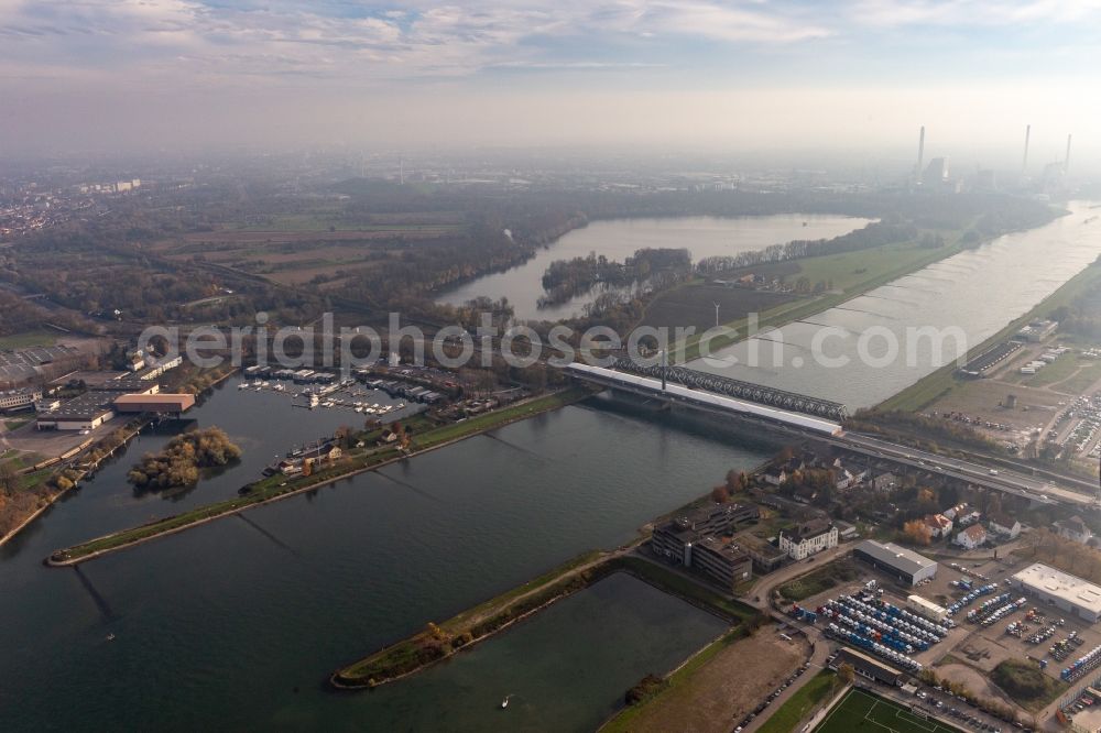 Wörth am Rhein from the bird's eye view: Rail and Street bridges with a huge tent for renovation purposes across the Rhine river between Karlsruhe and Woerth am Rhein in the state Rhineland-Palatinate, Germany