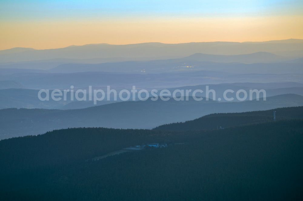 Aerial image Oberhof - Forest and mountain landscape of the mid-mountain range in the morning mist in Oberhof at Thueringer Wald in the state Thuringia, Germany