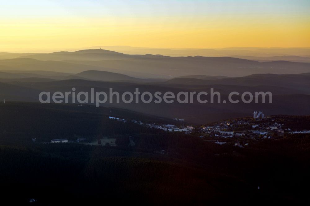 Oberhof from the bird's eye view: Forest and mountain landscape of the mid-mountain range in the morning mist in Oberhof at Thueringer Wald in the state Thuringia, Germany