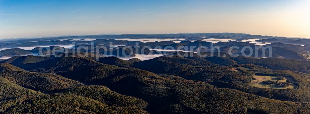 Aerial photograph Langensoultzbach - Low mountain landscape covered by forests with valleys of the Northern Vosges covered by ground fog in Langensoultzbach in Grand Est, France