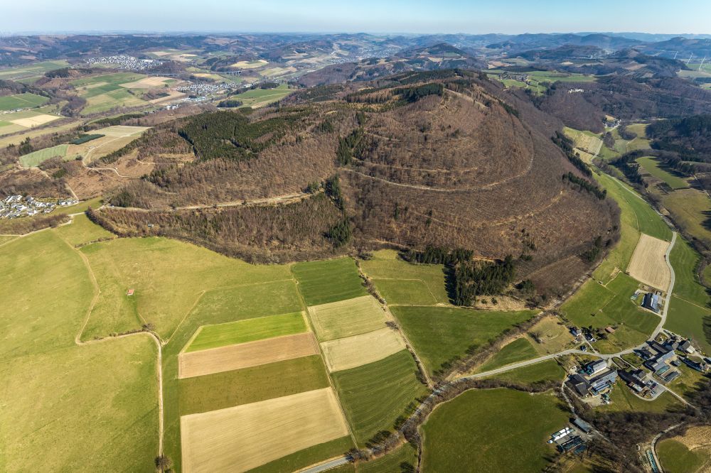 Aerial image Meschede - Forest and mountain landscape of the mid-mountain range of Vogelsang Berg bei Heggen in Meschede at Sauerland in the state North Rhine-Westphalia, Germany