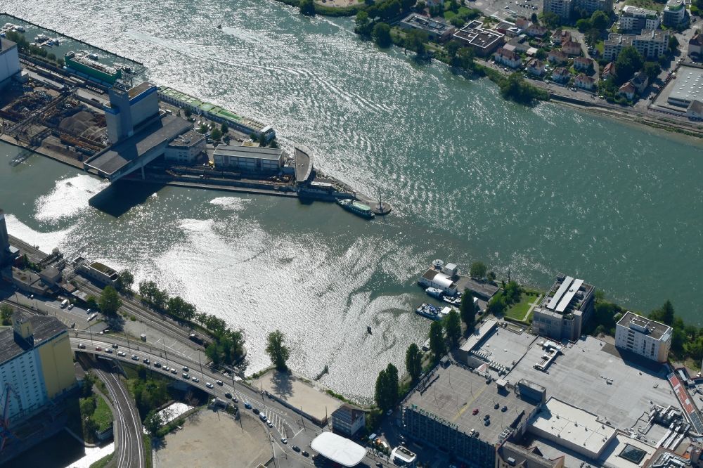 Aerial image Basel - In the middle of the river Rhine the three countries Germany, Switzerland and France merge in Basel in Switzerland. A Pylon is symbolising the location in the harbor area of Basle in Switzerland