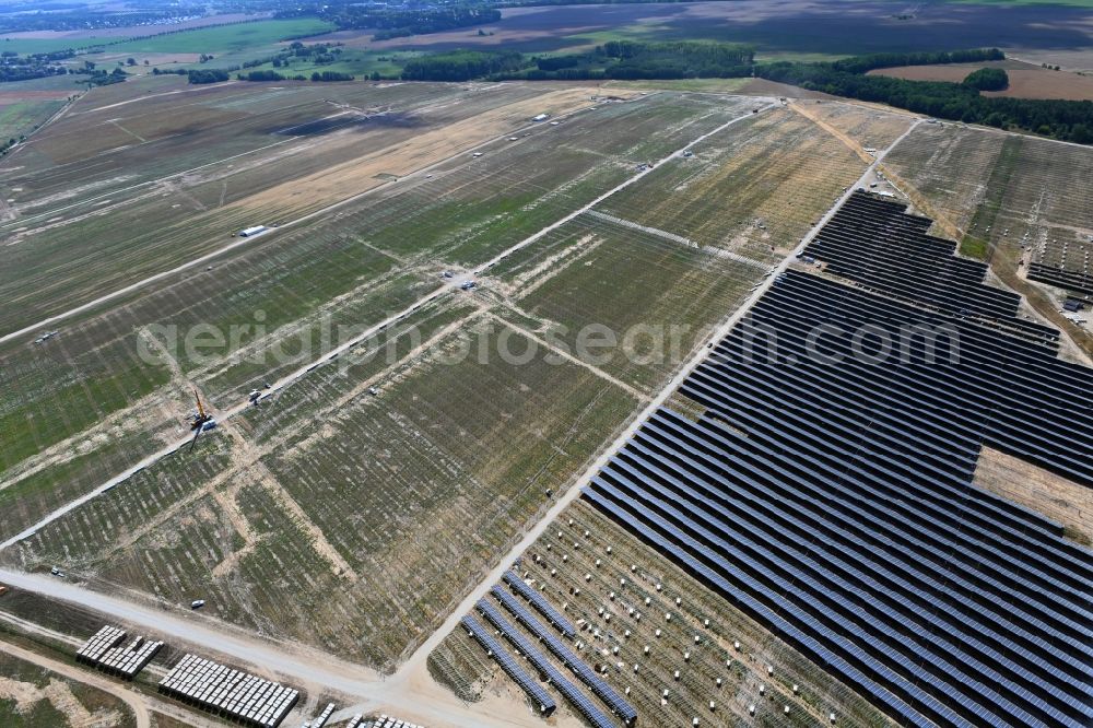 Aerial photograph Willmersdorf - Construction site and assembly work for solar park and solar power plant in Willmersdorf in the state Brandenburg, Germany
