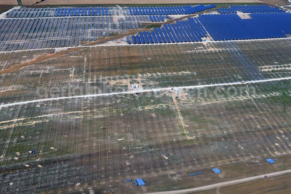 Willmersdorf from the bird's eye view: Construction site and assembly work for solar park and solar power plant in Willmersdorf in the state Brandenburg, Germany